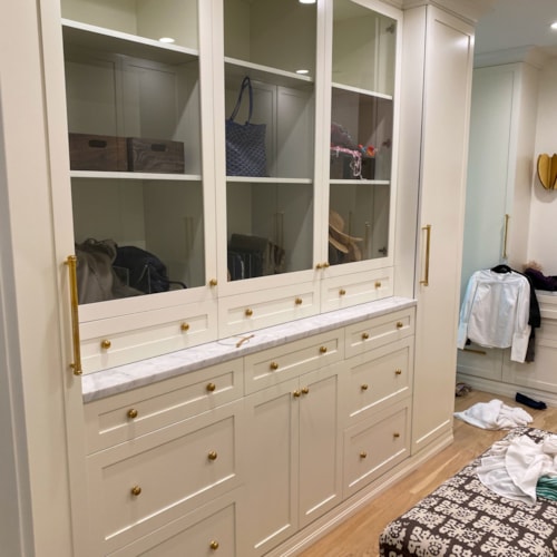 Custom Closet with Glass Showcase Doors