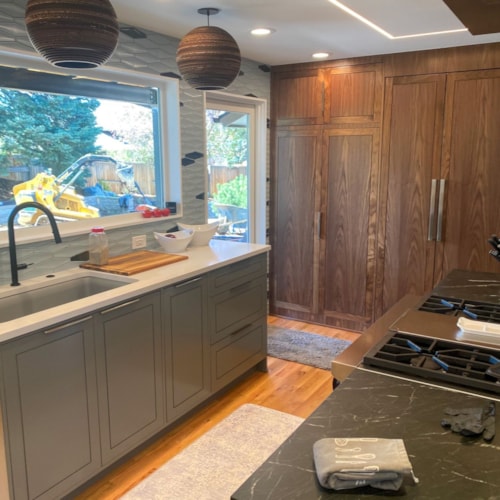 Gray Sage Kitchen Remodel with Walnut Pantry Cabinets